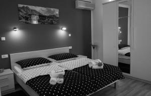 Posteľ alebo postele v izbe v ubytovaní Apartment Sabioncello