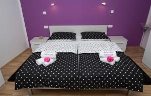 Posteľ alebo postele v izbe v ubytovaní Apartment Sabioncello