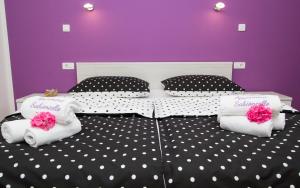 Posteľ alebo postele v izbe v ubytovaní Apartment Sabioncello