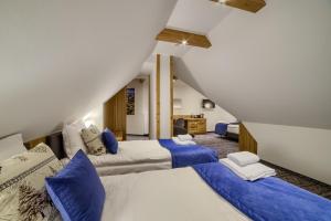 Posteľ alebo postele v izbe v ubytovaní Hotel Górski