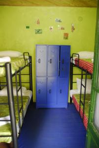 Palanda nebo palandy na pokoji v ubytování Hostal Gastro Bar Casa Colibrí