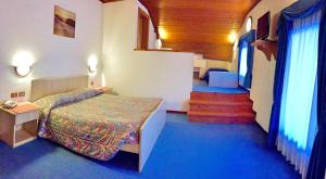 Postel nebo postele na pokoji v ubytování Hotel Siera Hof