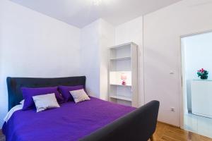 Postel nebo postele na pokoji v ubytování Apartments Marina