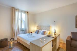Voodi või voodid majutusasutuse Apartments Florence - MaggioTerrace toas