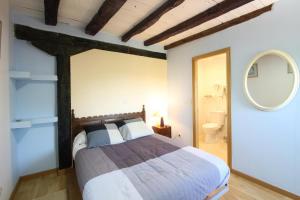 Katil atau katil-katil dalam bilik di La Posada Del Santuario