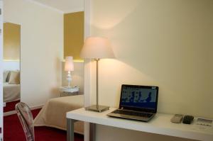 TV a/nebo společenská místnost v ubytování Hotel Lagoa dos Pastorinhos