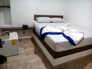 Postel nebo postele na pokoji v ubytování Hotel Salamanca Resort