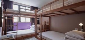 Katil atau katil-katil dalam bilik di Orange Hotel - Wenhua, Chiayi