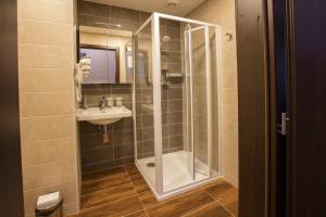 Koupelna v ubytování Hotel Bellevue Tlapak