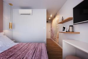 Posteľ alebo postele v izbe v ubytovaní Rooms Albachiara
