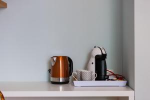 Príslušenstvo na prípravu kávy alebo čaju v ubytovaní Rooms Albachiara