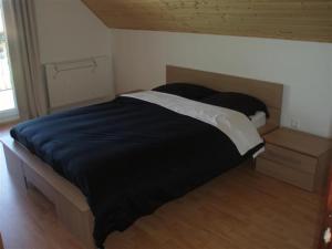 Tempat tidur dalam kamar di Balaton Villa Gyenes