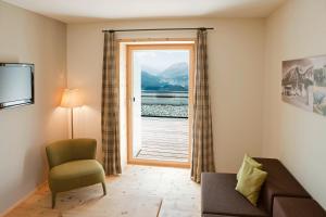 Posezení v ubytování Romantik Hotel Muottas Muragl