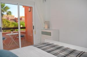Łóżko lub łóżka w pokoju w obiekcie Albatros Playa 2 - 9408