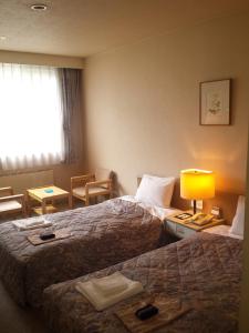 Llit o llits en una habitació de Mount View Hotel