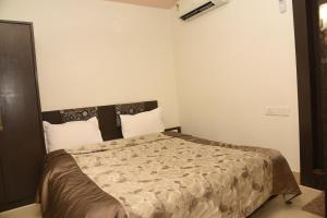 Postel nebo postele na pokoji v ubytování Hotel Pybss