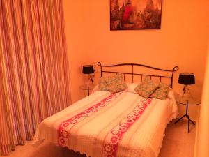 Posteľ alebo postele v izbe v ubytovaní Apartamentos Doñana