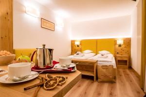 Postel nebo postele na pokoji v ubytování Hotel Gran Paradis