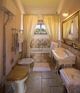 Ett badrum på Resort La Ghiaia