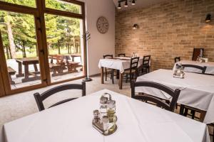 Reštaurácia alebo iné gastronomické zariadenie v ubytovaní B&B Villa Angy