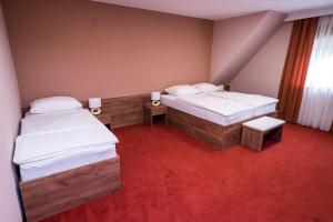 Posteľ alebo postele v izbe v ubytovaní B&B Villa Angy