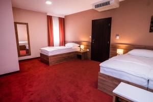 Posteľ alebo postele v izbe v ubytovaní B&B Villa Angy