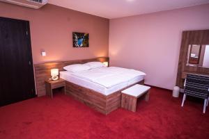 Posteľ alebo postele v izbe v ubytovaní B&B Villa Angy