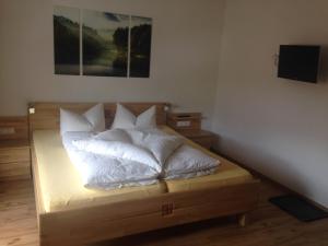 Posteľ alebo postele v izbe v ubytovaní Landhaus Engadin