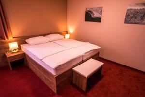 Posteľ alebo postele v izbe v ubytovaní B&B Villa Angy