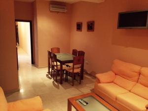 Posedenie v ubytovaní Apartamentos Doñana