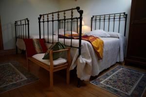 Postel nebo postele na pokoji v ubytování Posada Molino del Canto