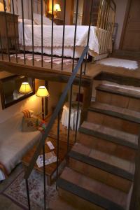 Postel nebo postele na pokoji v ubytování Posada Molino del Canto