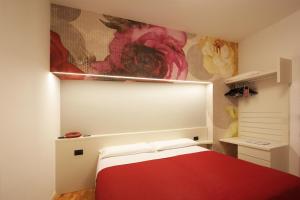 Letto o letti in una camera di Park Hotel Meublé