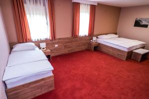 Posteľ alebo postele v izbe v ubytovaní B&B Villa Angy