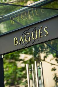 a sign for a bagel shop at Hotel Bagués, a Small Luxury Hotel of the World in Barcelona