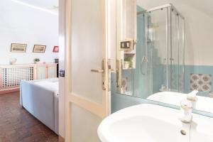 Posteľ alebo postele v izbe v ubytovaní Piazza Colonna Apartment - Charme Holidays
