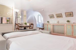 Posteľ alebo postele v izbe v ubytovaní Piazza Colonna Apartment - Charme Holidays
