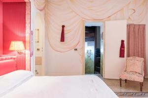 Posteľ alebo postele v izbe v ubytovaní Piazza Colonna Apartment - Charme Holidays