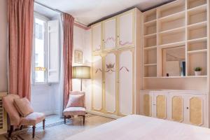 Posteľ alebo postele v izbe v ubytovaní Piazza Colonna Apartment - Charme Holidays