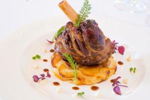 a plate of food with a piece of meat on top at Thalacap Île de Ré - Thalasso & Spa in Ars-en-Ré