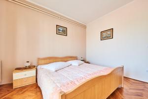 Postel nebo postele na pokoji v ubytování Apartment Erika
