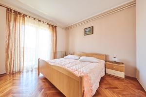 Postel nebo postele na pokoji v ubytování Apartment Erika