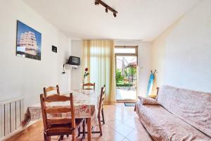 TV a/nebo společenská místnost v ubytování Apartment Erika