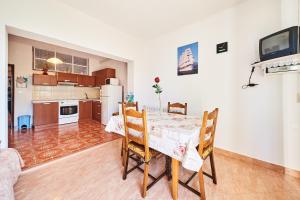 Kuchyň nebo kuchyňský kout v ubytování Apartment Erika