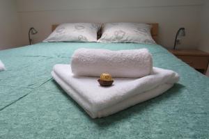 Кровать или кровати в номере Apartman Rincic