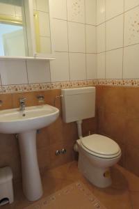 Ванная комната в Apartman Rincic