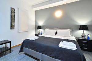 Posteľ alebo postele v izbe v ubytovaní Plaka Elegant Apartment
