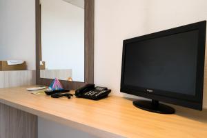 TV a/nebo společenská místnost v ubytování Hotel Port-Bo