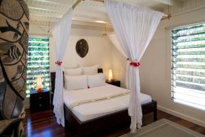 Postel nebo postele na pokoji v ubytování Taveuni Palms Resort + 37 fotografií