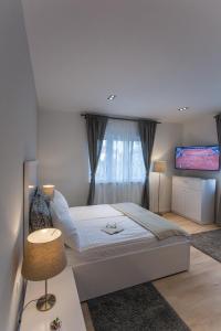 Postel nebo postele na pokoji v ubytování Priuli Luxury Rooms
